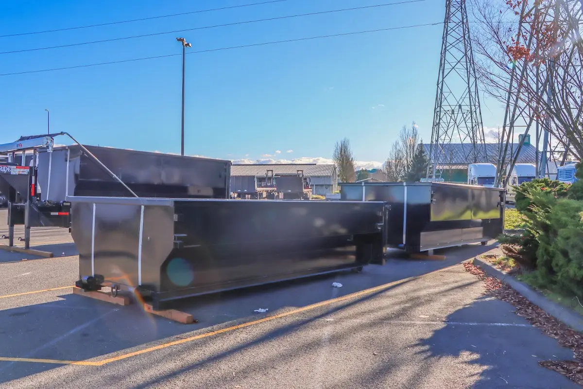 Roll-off dumpster ready for waste disposal at job site for Roll Off Dumpster Rental in Alton